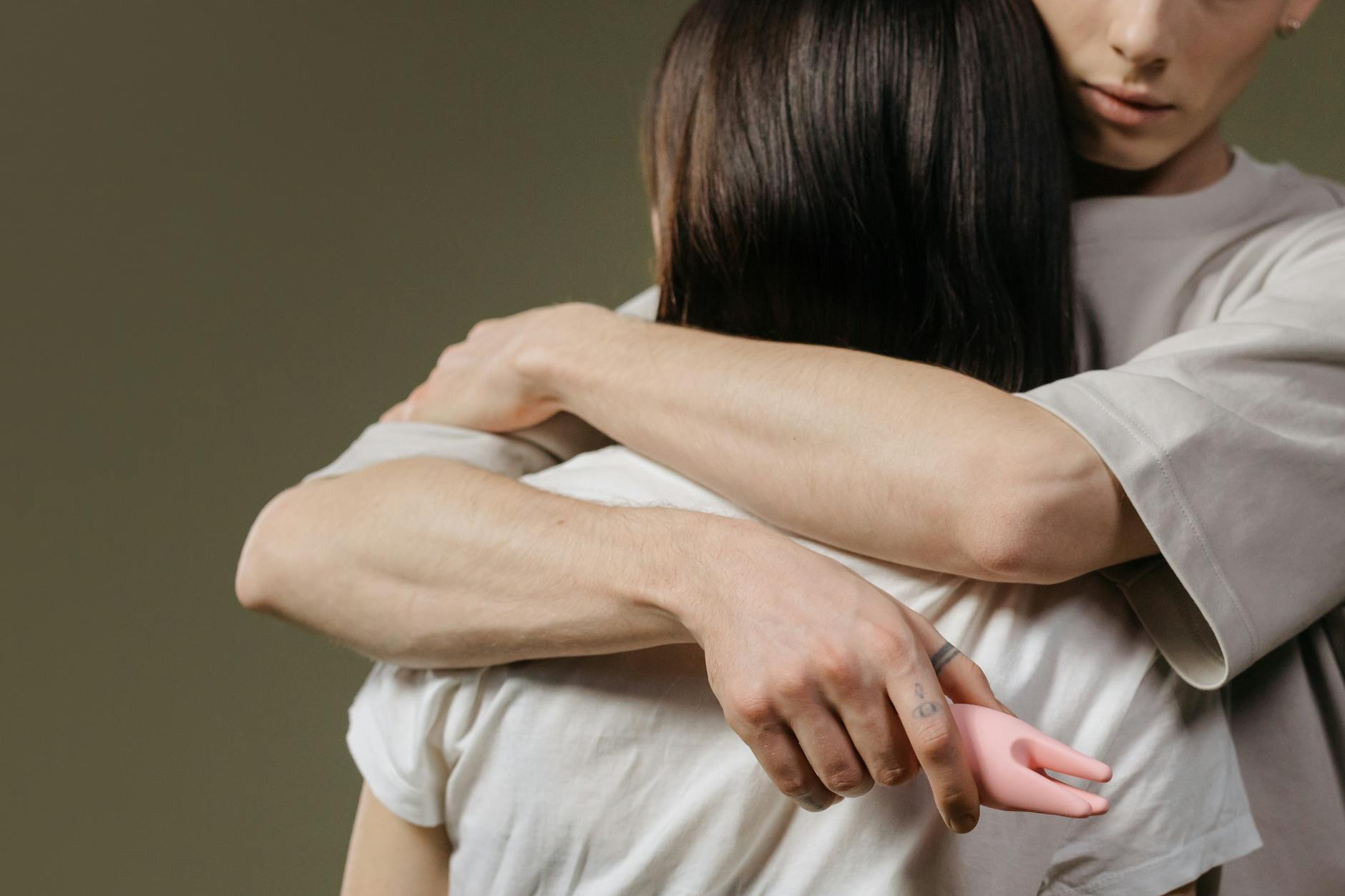 A couple embracing closely, illustrating emotional connection and trust between partners.